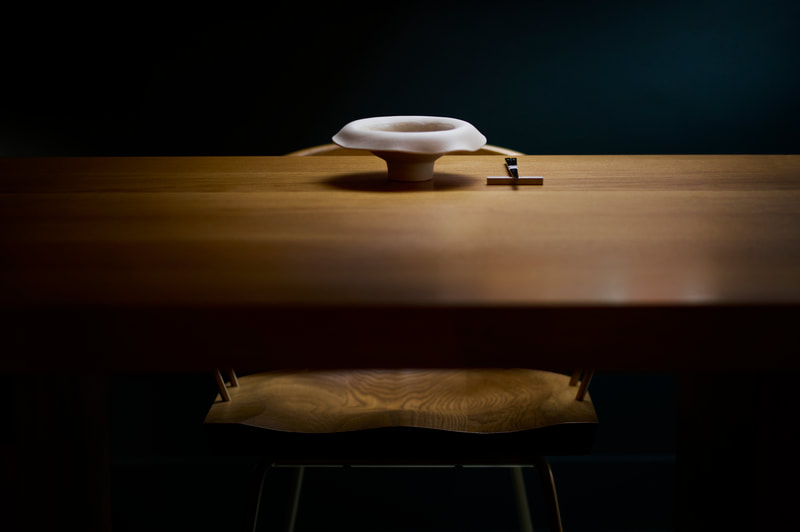 moody shot of design plate on wooden table
